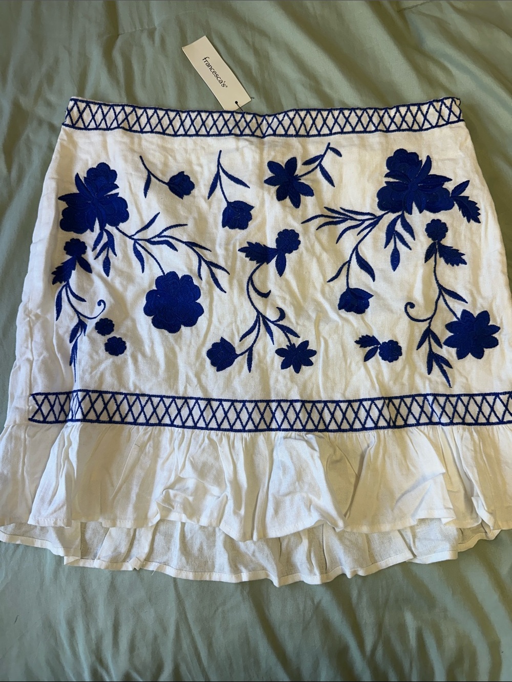 Francesca's Collections White Mini Skirt with Royal Blue Floral Embroidery